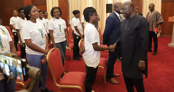 Vice-President Dr Mahamudu Bawumia (right), in a handshake with Anastasia Achaa,  captain of the Black Princesses after a meeting at the Jubilee House.